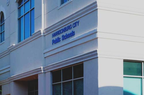 The sign above the door of the Harrisonburg City Schools building in Harrisonburg, VA.